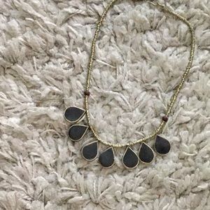 Gold tribal style statement necklace